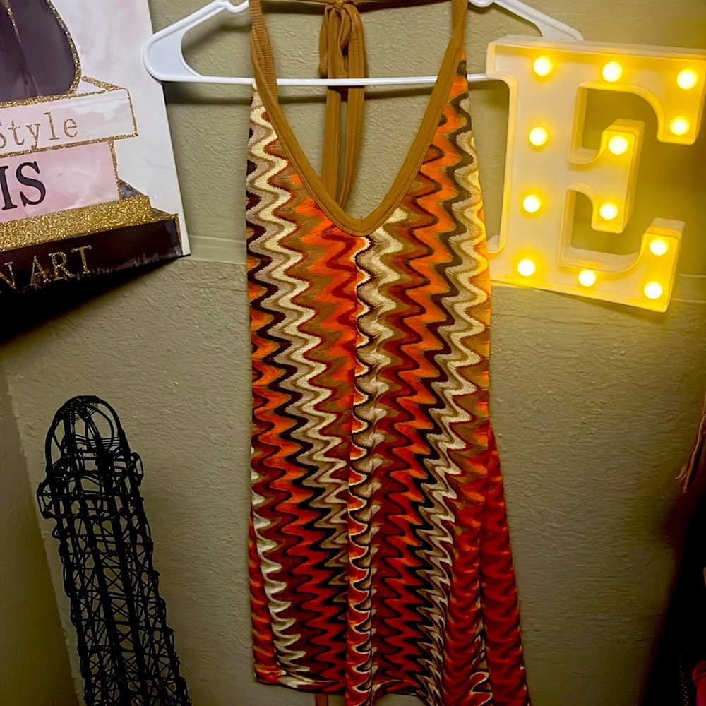 Very cute mini dress also can use as a shirt. Used once